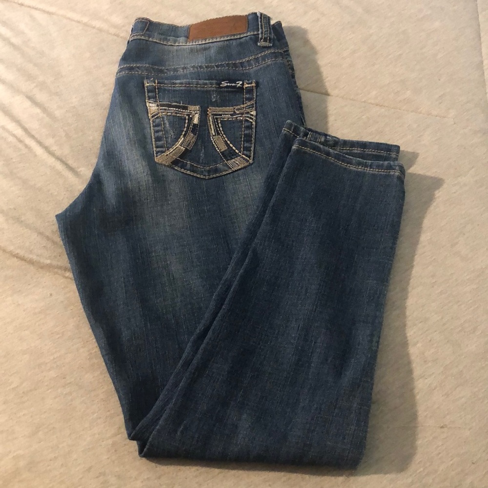 Medium wash skinny easy fit seven jeans